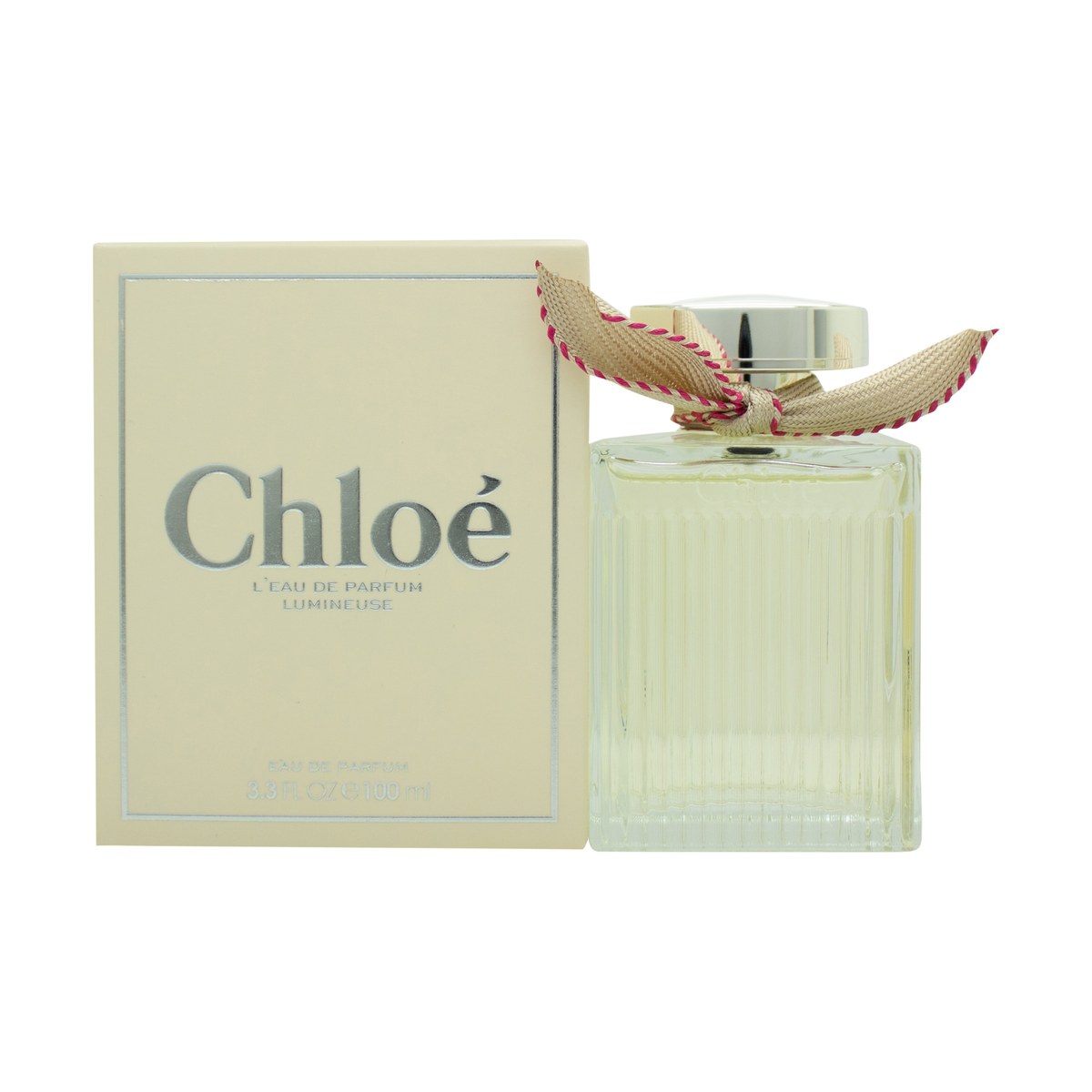 Chloé Eau de Parfum Lumineuse, Chloé, 100 ml – klar riflet glasflaske med beige sløjfe og gyldent låg