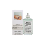 Maison Margiela Replica Bubble Bath Eau de Toilette 100 ml – klar rektangulær glasflaske med hvid etiket og sølvfarvet låg
