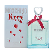 Funny Eau De Toilette Moschino 100 ml, klar glasflaske med rund form, sølv hjerteformet låg og fuchsia bånd ved halsen