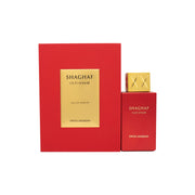 Swiss Arabian Shaghaf Oud Ahmar Eau de Parfum 75 ml fra Swiss Arabian i dybrød glasflaske med gylden metalkapsel og orientalsk mønster.
