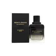 Gentleman Boisée Eau De Parfum, Givenchy, 60 ml – rektangulær glasflaske med ravfarvet duft, sort låg og mørkt træbånd