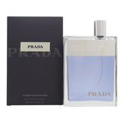 Prada Amber Pour Homme Eau De Toilette 100 ml fra Prada, rektangulær klar glasflaske med sølvlogo og sort sprayhoved.