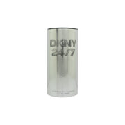 DKNY 24/7 For Her Eau de Parfum 50 ml – slank, cylindrisk glasflaske i klar med sølvtonet låg og minimalistisk logo