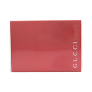 Rush Eau De Toilette, Gucci, 75 ml – rød rektangulær flaske i blank plast med sort logo, enkel og markant form