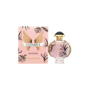 Paco Rabanne Olympea Blossom Eau de Parfum 80 ml i rund lyserød glasflakon med blomsterprint og rosaguld vingerlåg.