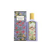 Flora Gorgeous Magnolia Eau De Parfum, Gucci 100 ml – lyserød rektangulær glasflaske med sort låg og farverigt blomsterdesign