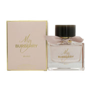 Burberry My Burberry Blush Eau de Parfum 90 ml fra Burberry, lyserød glasflaske med sløjfe og gyldent låg.