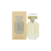 The Scent Pure Accord Eau De Toilette Hugo Boss 50 ml klar glasflakon med cylindrisk form, sølvfarvet låg og ravfarvet duft