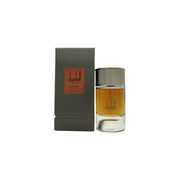 Dunhill British Leather Eau de Parfum 100 ml Dunhill, mørkebrun rektangulær glasflakon med sort låg og gyldent emblem.