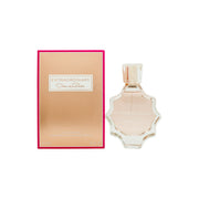 Oscar de la Renta Extraordinary Eau de Parfum 90 ml – høj facetteret glasflakon med lys rosé væske og guldkapsel med sort blomst