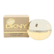 DKNY Golden Delicious Eau de Parfum 50 ml, rund gylden æbleformet glasflaske med spejlblank top og klar juice.