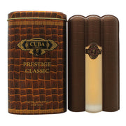Cuba Prestige Gold Eau de Toilette 90 ml fra Cuba i guldfarvet cigarformet flakon med sort og guld detalje.